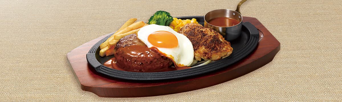 黒×黒ハンバーグ&スパイシーチキン~ブラウンバターソース目玉焼き付~